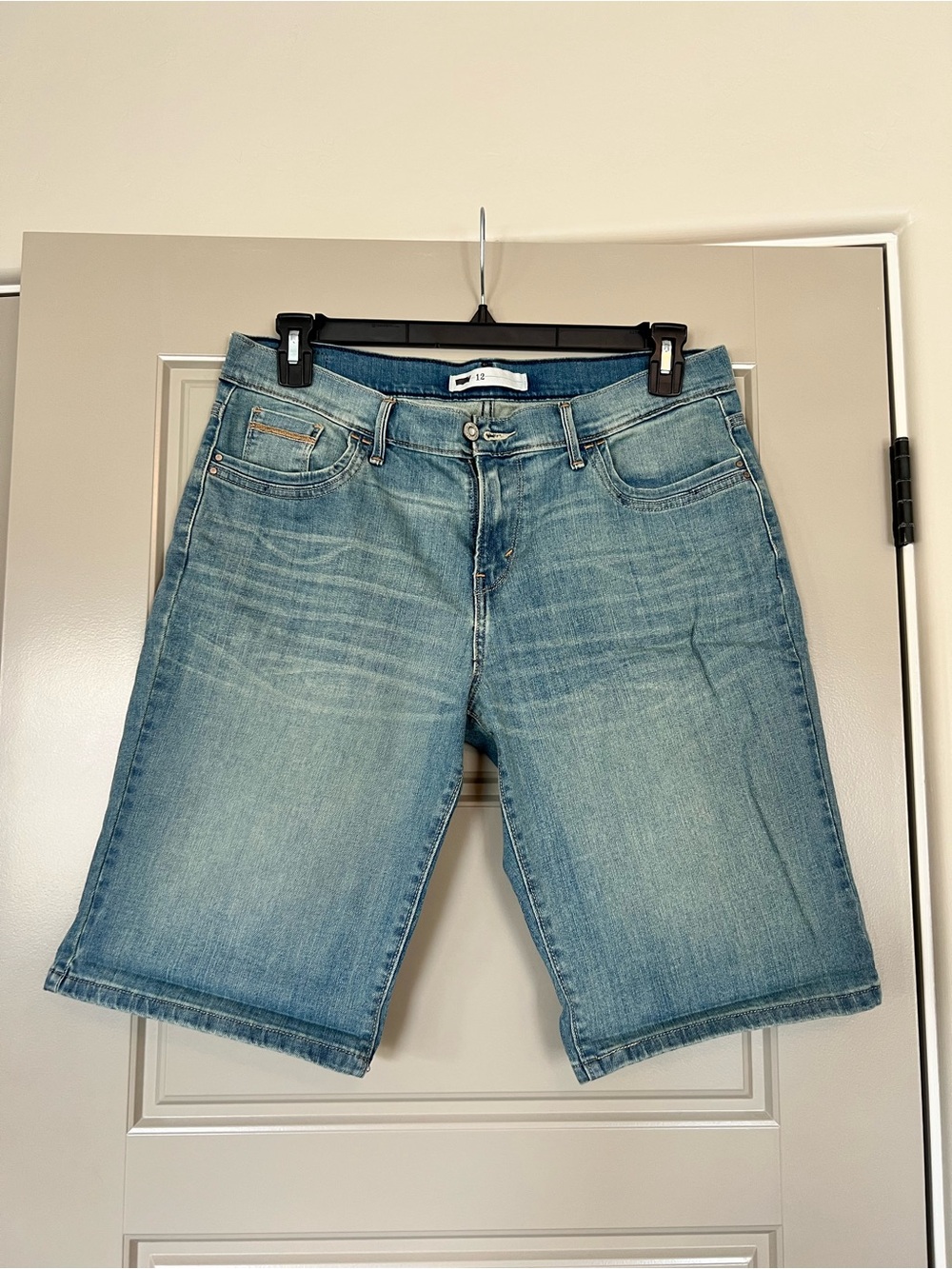 Levi's light blue denim shorts with vintage button